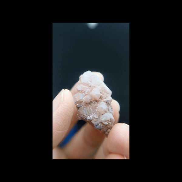 Red-coated quartz cluster from Inner Mongolia — complete front view