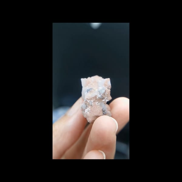Red-coated quartz cluster from Inner Mongolia — alternate side view