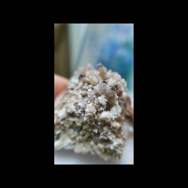 Yttrium-bearing fluorite on matrix — complete front view