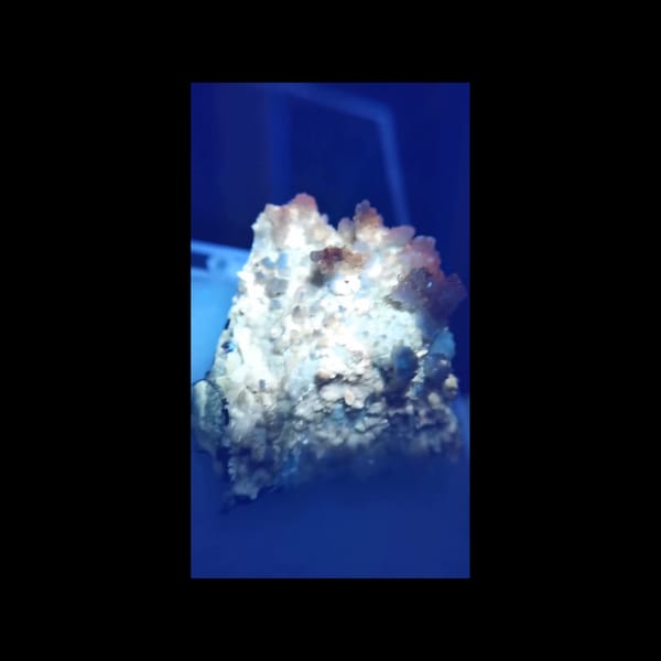 Yttrium-bearing fluorite on matrix — alternate side view