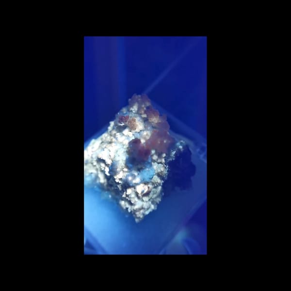 Yttrium-bearing fluorite on matrix — additional angle