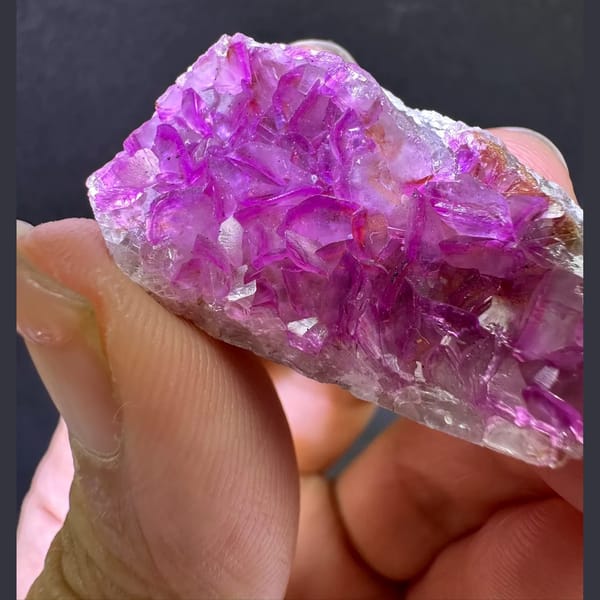 Hot-pink cobaltoan calcite petal druse from Congo — detail view