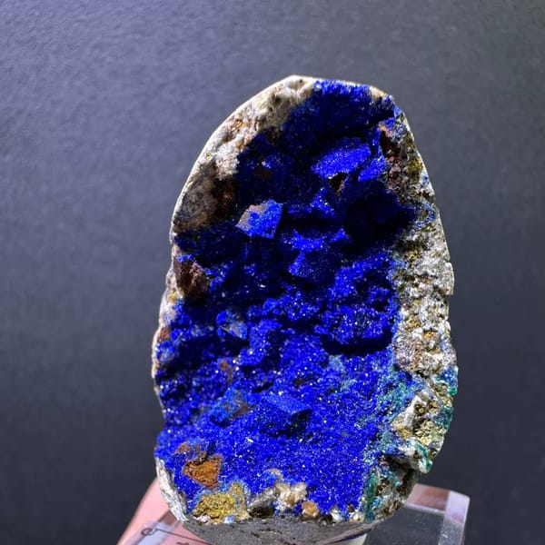 Royal-blue azurite crystals filling a siderite pocket from Yunnan — detail view