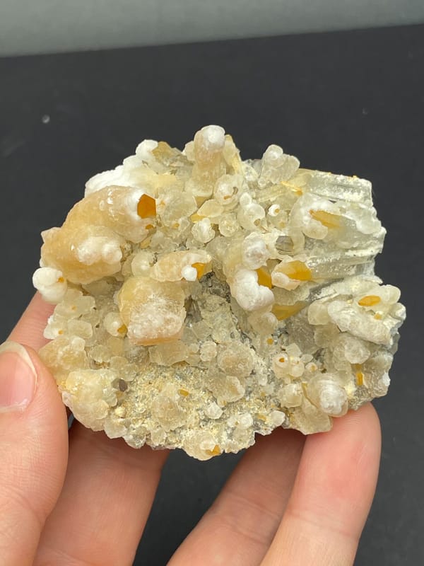 Cream-yellow citrine and calcite crust from Jinkouhe, Sichuan, China, second angle