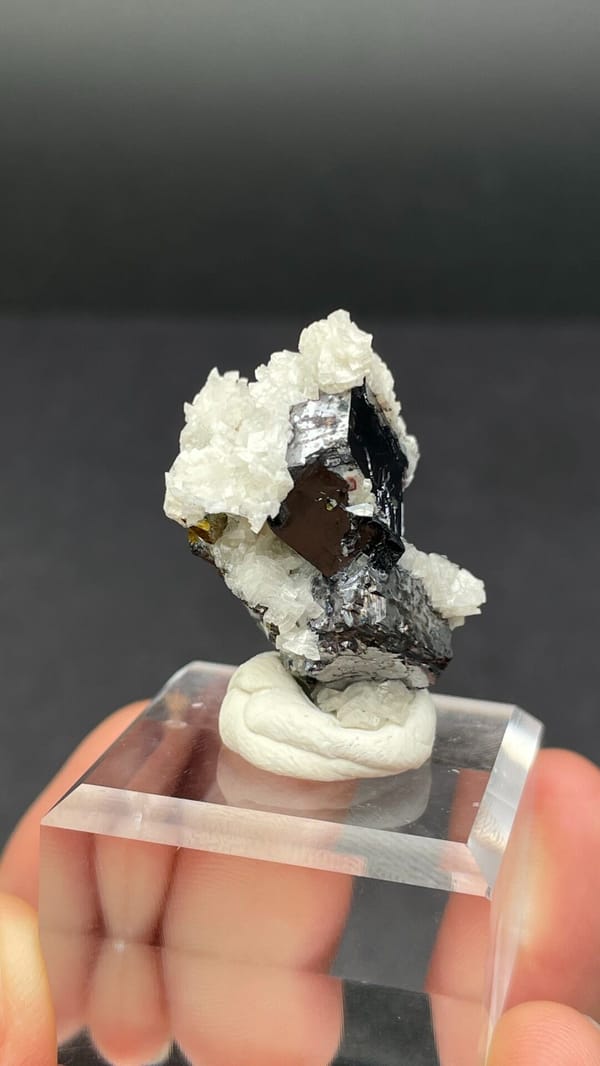 Metallic galena crystal in white dolomite crust from Jiangxi, China, second angle