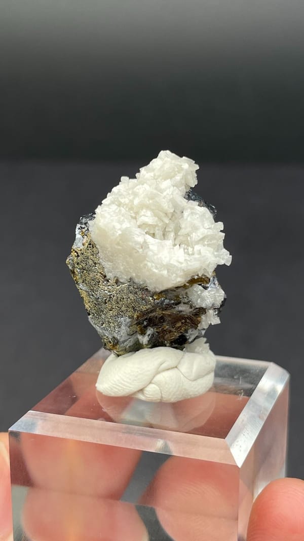 Metallic galena crystal in white dolomite crust from Jiangxi, China, reverse side