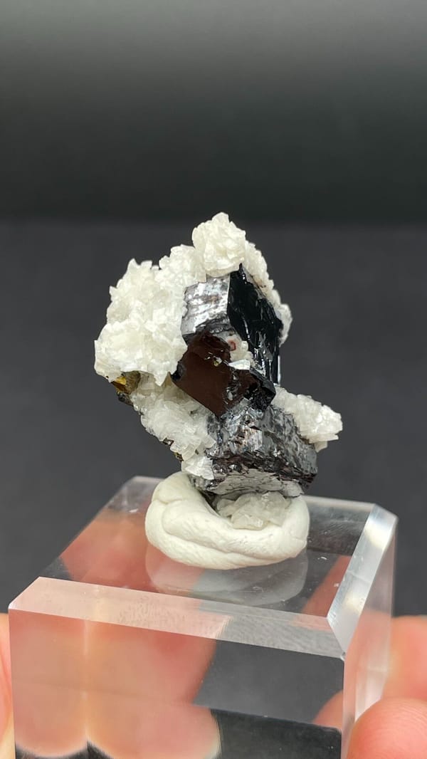 Metallic galena crystal in white dolomite crust from Jiangxi, China, top view