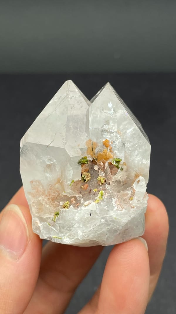 Garden quartz crystal with green epidote inclusions from Meigu, Sichuan, China