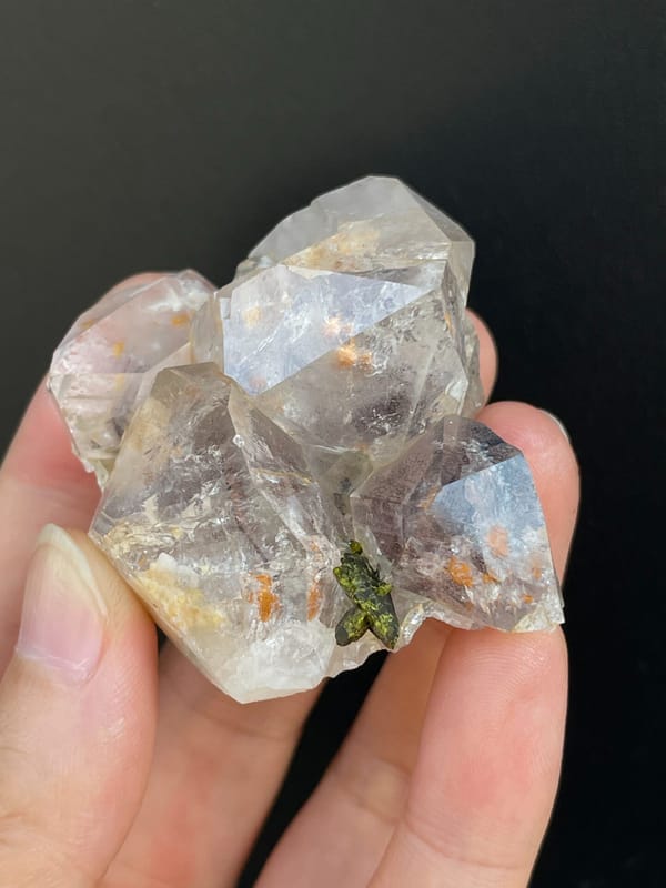 Clear garden quartz with green epidote inclusions from Meigu, Sichuan, China