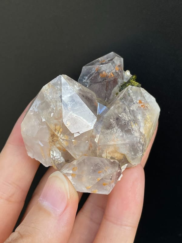 Clear garden quartz with green epidote inclusions from Meigu, Sichuan, China, reverse side