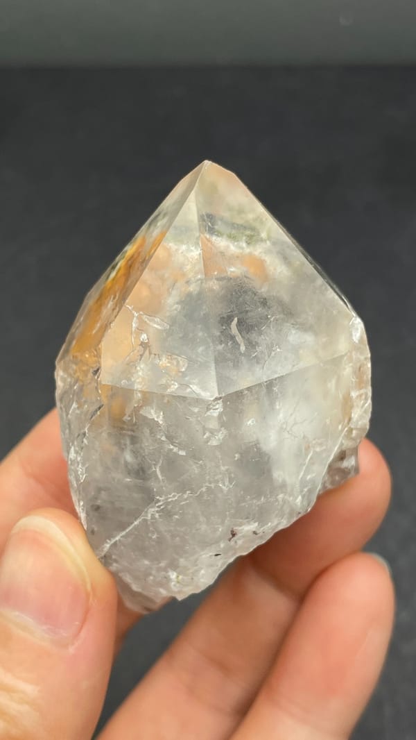 Large garden quartz crystal with epidote inclusions from Meigu, Sichuan, China, reverse side