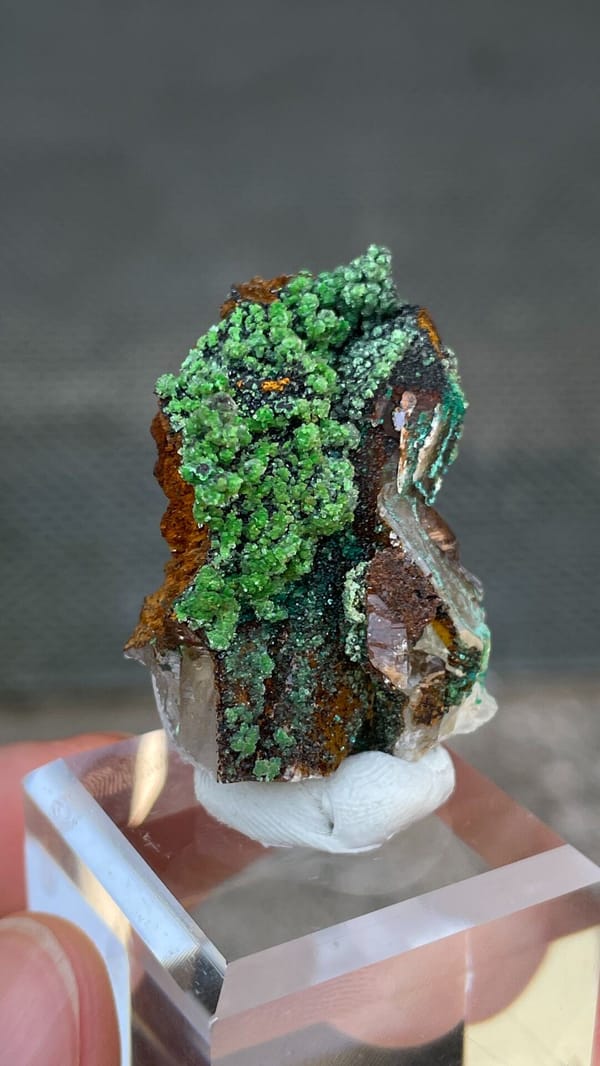 Grass-green conichalcite balls on quartz and matrix from Morocco, reverse side