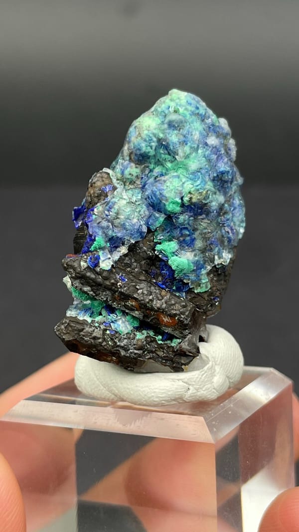 Blue azurite and green malachite rosettes on quartz from Morocco, top view