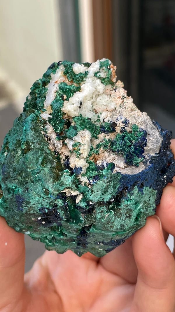 Deep blue azurite with green malachite pocket from Anhui, China, detail of the matrix contact
