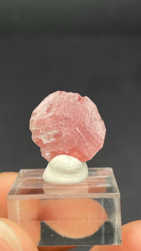Pink rhodochrosite rosette on quartz from Wuzhou, Guangxi, China, close-up of the crystal faces