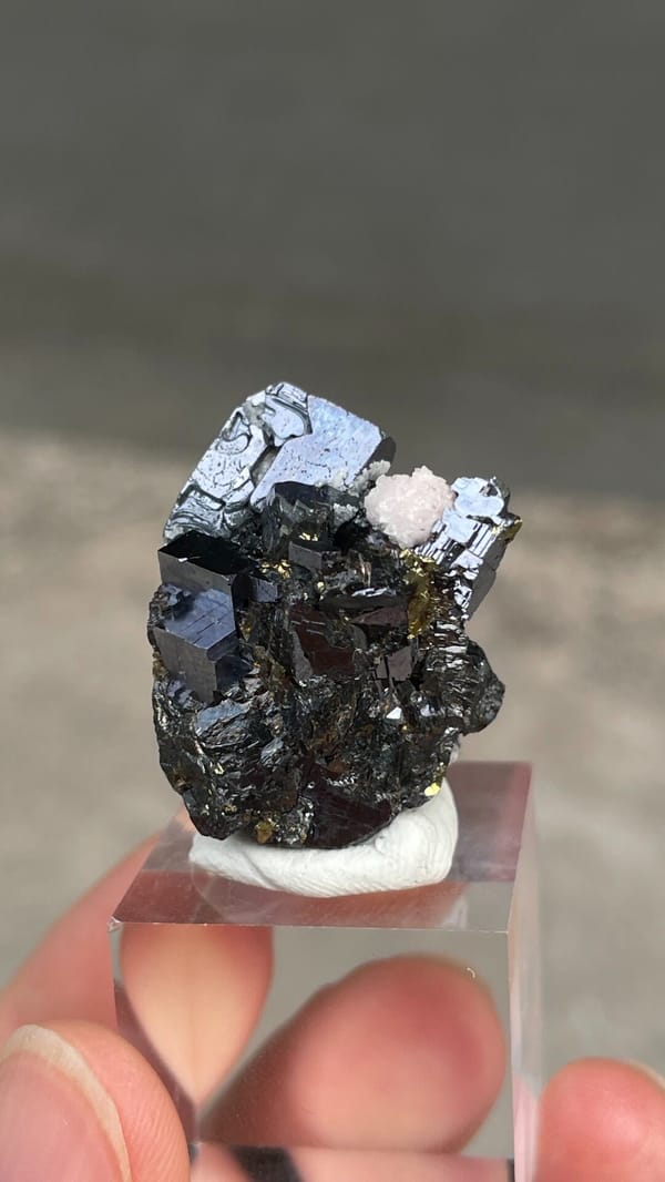 Metallic galena with chalcopyrite and pink rhodochrosite from Peru, second angle