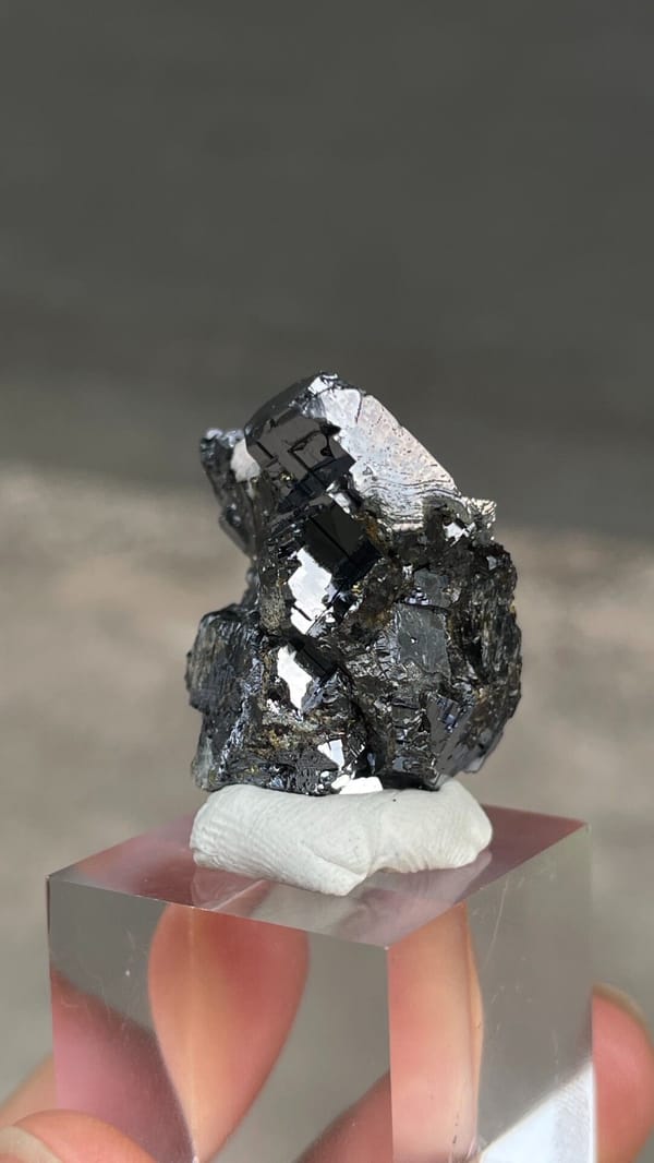 Metallic galena with chalcopyrite and pink rhodochrosite from Peru, reverse side
