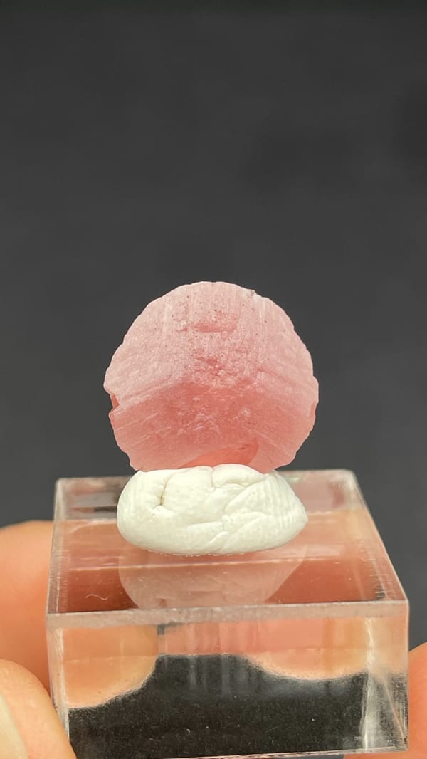 Rose-pink rhodochrosite shell on quartz from Wuzhou, Guangxi, China, second angle