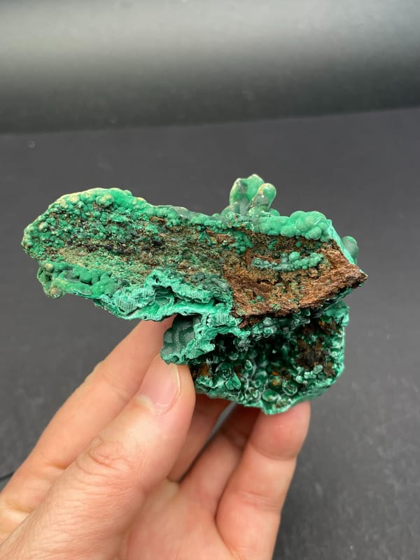 Emerald green botryoidal malachite from Yangchun, Guangdong, China, close-up of the crystal faces