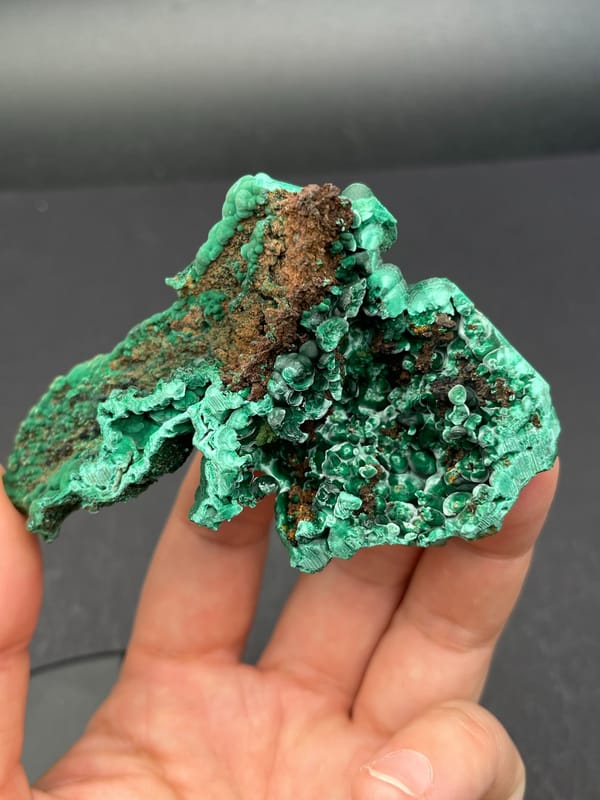 Emerald green botryoidal malachite from Yangchun, Guangdong, China, reverse side