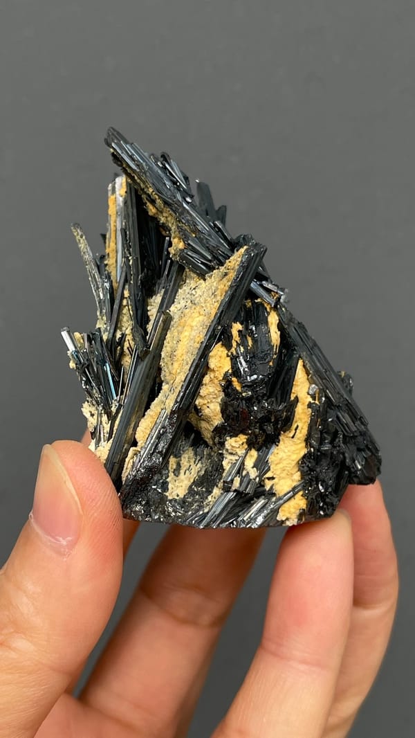 Radiating steel-grey stibnite blades from Yunnan, China, top view