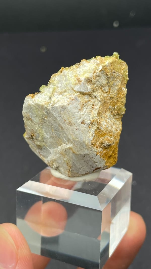 Yellow-green pyromorphite on ochre limonite matrix from Guangdong, China, detail of the matrix contact