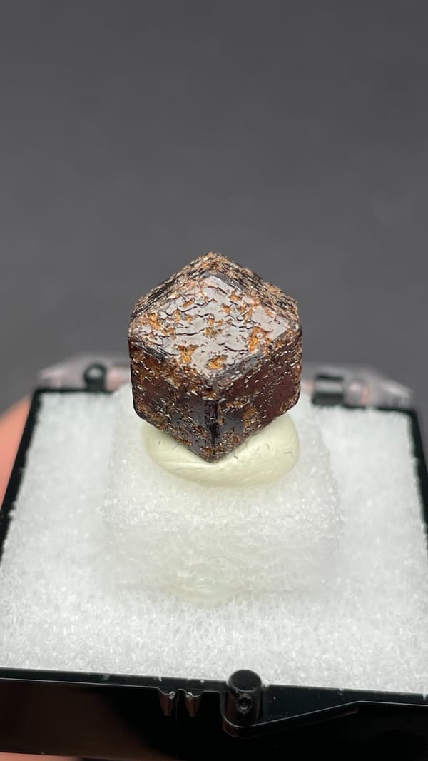 Dark brown dodecahedral andradite garnet crystal from Handan, Hebei, China