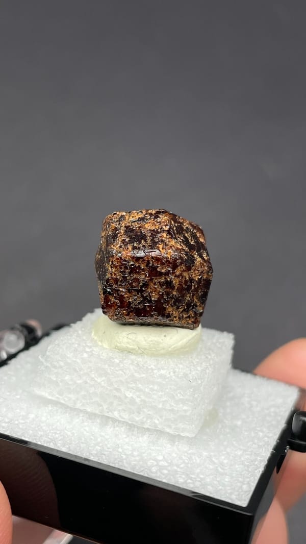 Dark brown dodecahedral andradite garnet crystal from Handan, Hebei, China, second angle
