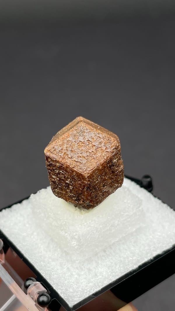 Brown dodecahedral andradite garnet single crystal from Handan, Hebei, China, top view