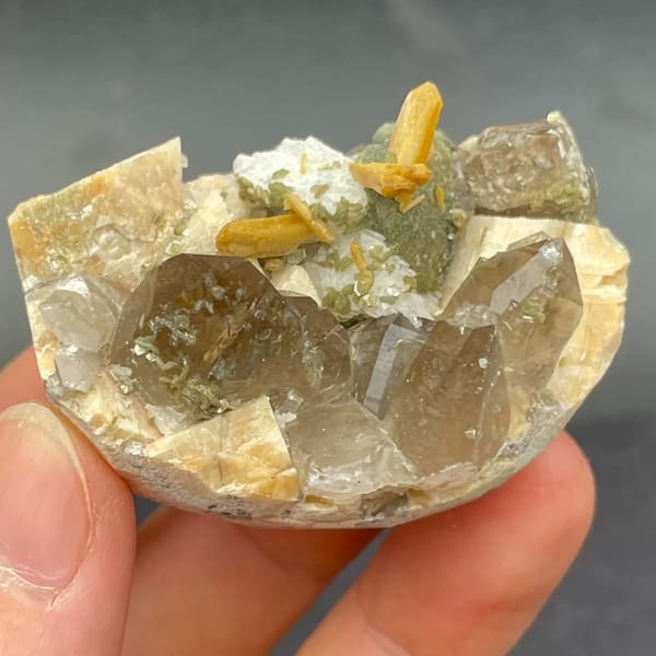 Smoky quartz with golden stilbite, mica and feldspar from Fujian — alternate view
