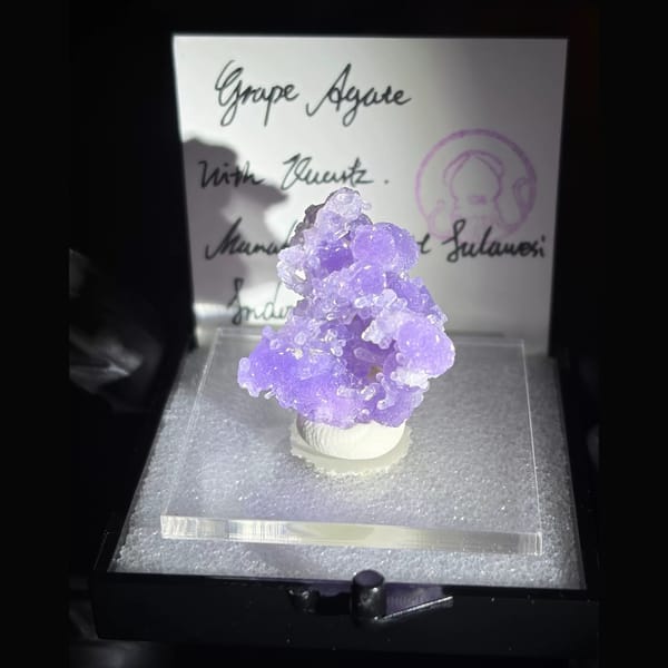 Purple botryoidal grape agate with small quartz crystals from Sulawesi — complete view