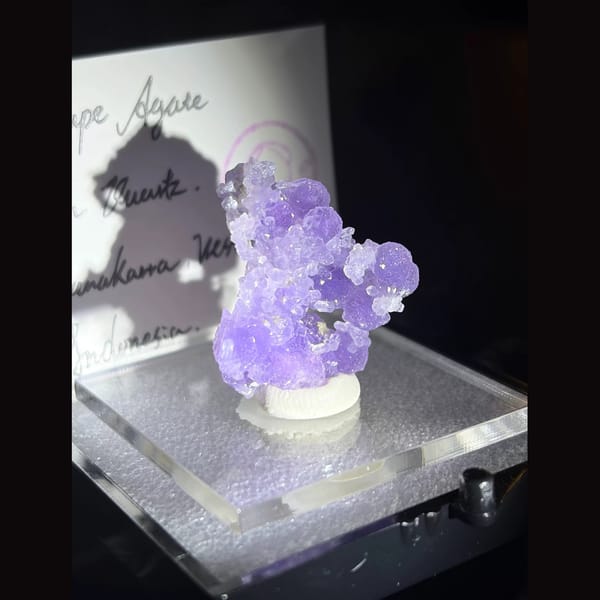 Purple botryoidal grape agate with small quartz crystals from Sulawesi — alternate view