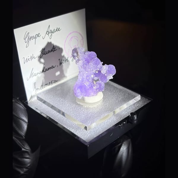 Purple botryoidal grape agate with small quartz crystals from Sulawesi — alternate view