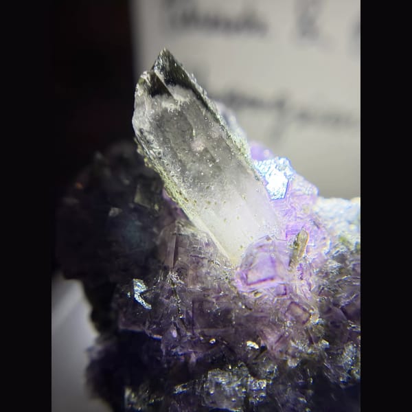 Purple fluorite with an upright quartz point and chlorite from Yaogangxian — alternate view