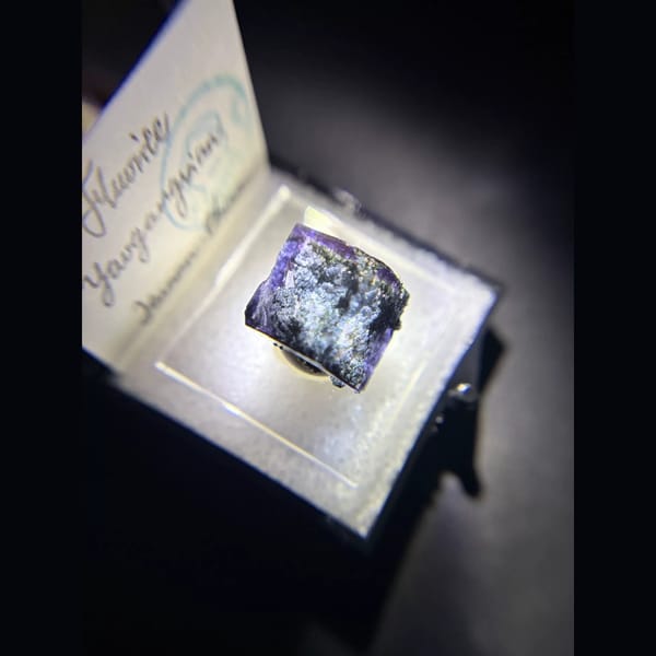 Deep blue-purple Yaogangxian fluorite cube in display box — alternate view