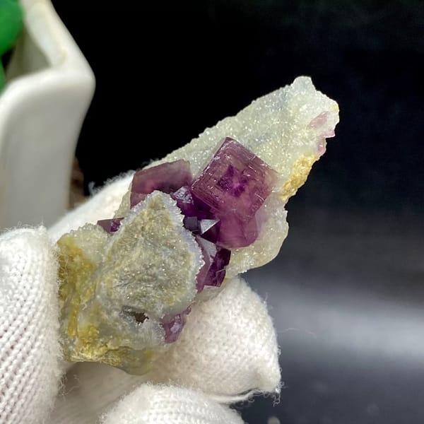 Magenta fluorite cube with fret patterning on white matrix from Anhui, China, view 3 of 9
