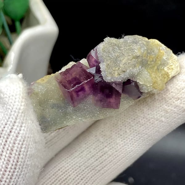 Magenta fluorite cube with fret patterning on white matrix from Anhui, China, view 8 of 9