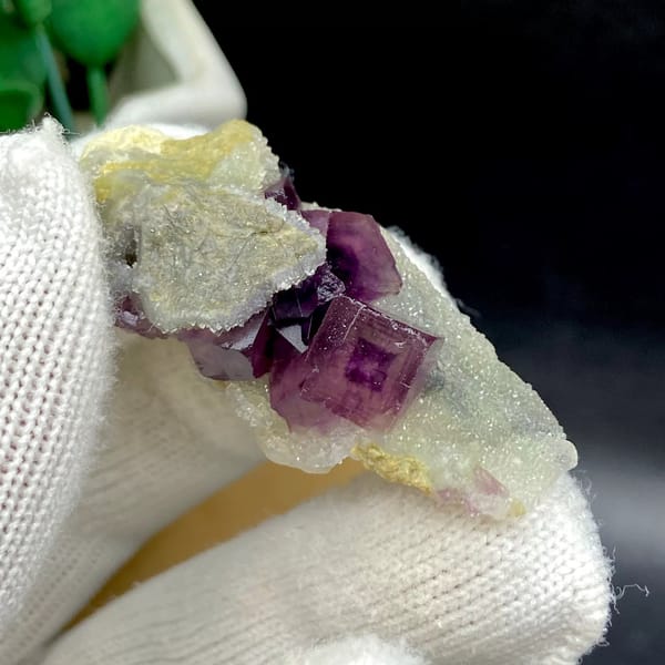 Magenta fluorite cube with fret patterning on white matrix from Anhui, China, view 9 of 9