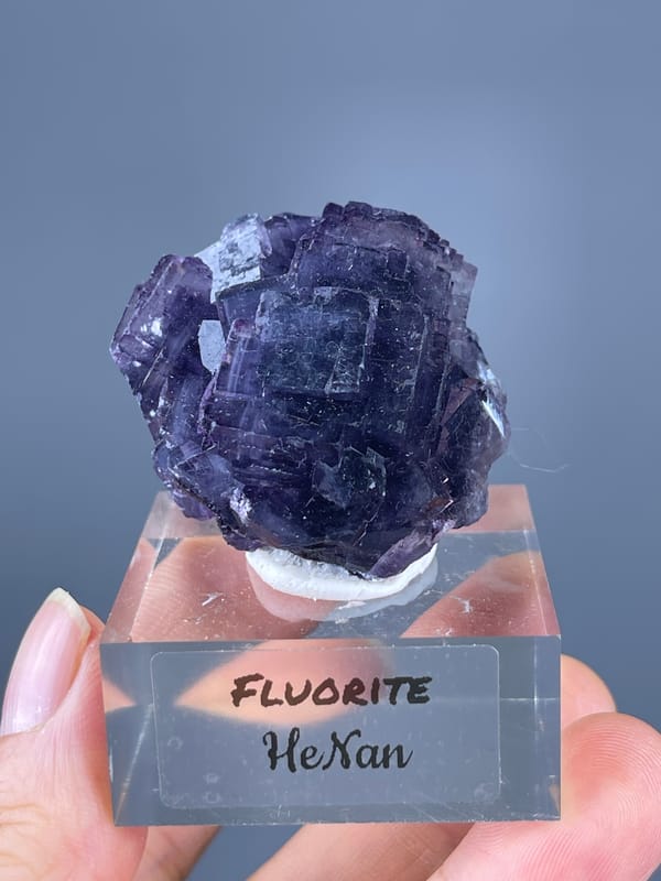 Purple Fluorite specimen from Henan, China featuring terraced purple cubic cluster