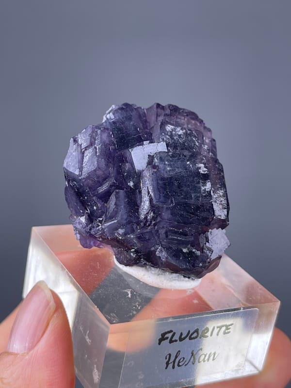 Purple Fluorite specimen from Henan, China, defined by terraced purple cubic cluster