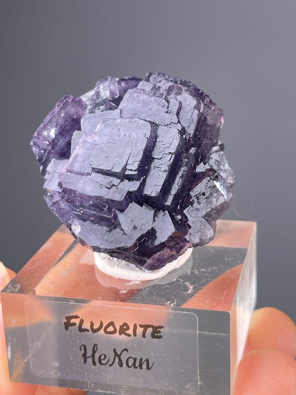 Purple Fluorite specimen from Henan, China presenting terraced purple cubic cluster