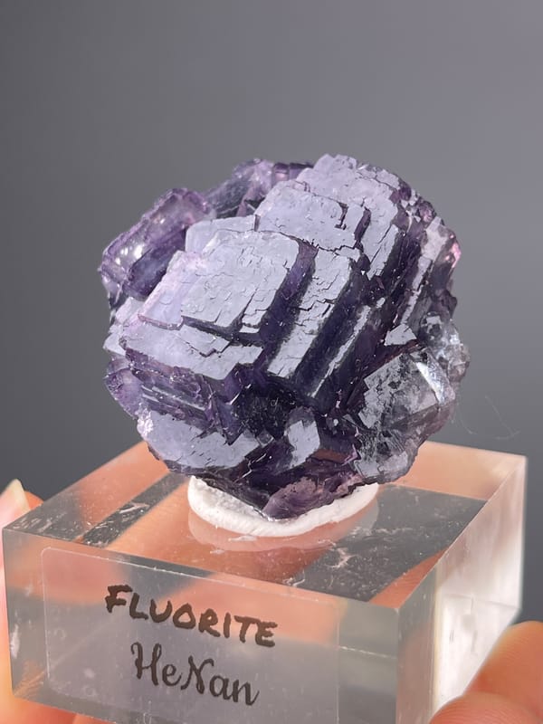 Terraced purple cubic cluster visible on purple fluorite specimen from Henan, China