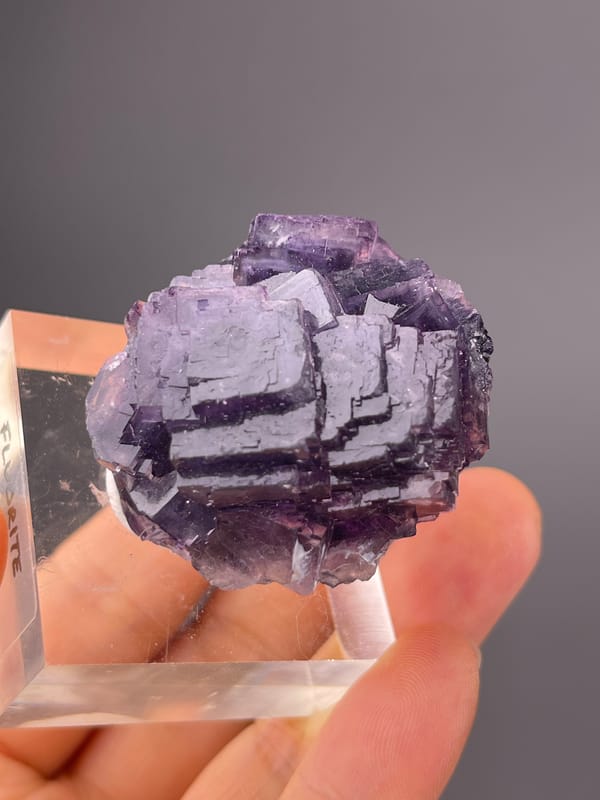 Purple Fluorite specimen from Henan, China, characterized by terraced purple cubic cluster