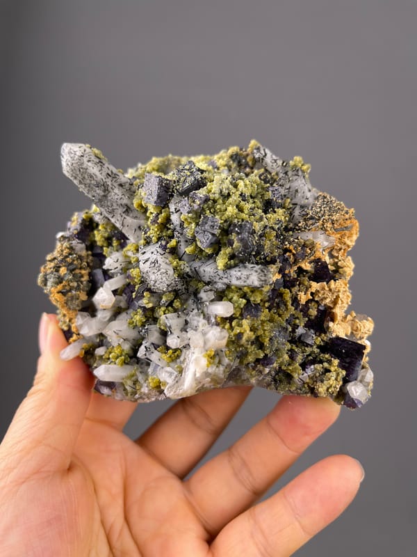 Purple Fluorite specimen from Yaogangxian Mine, Hunan, China featuring included clear quartz and purple cubes
