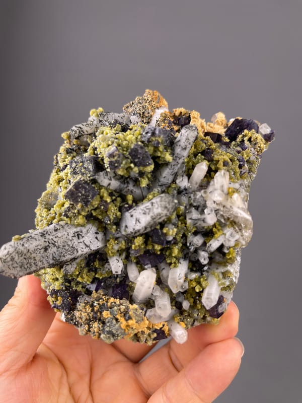 Purple Fluorite specimen from Yaogangxian Mine, Hunan, China, characterized by included clear quartz and purple cubes