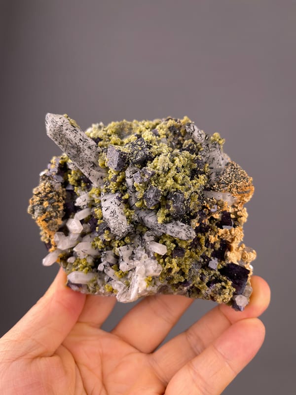 Purple Fluorite specimen from Yaogangxian Mine, Hunan, China bearing included clear quartz and purple cubes