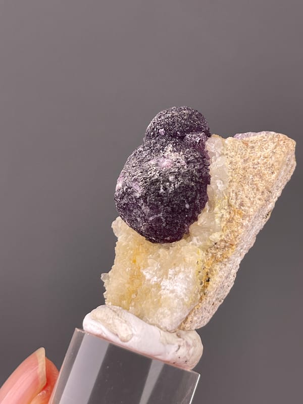 Purple Fluorite specimen from Xinyang, Henan, China bearing purple botryoidal fluorite aggregates