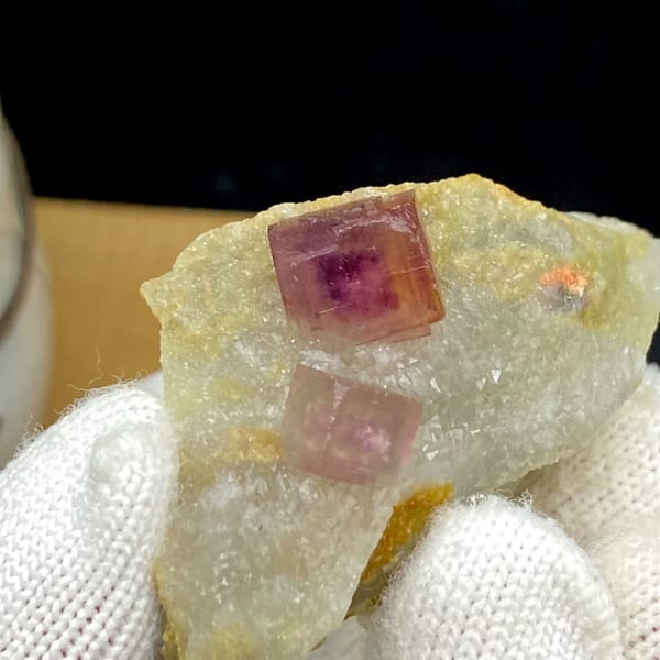 Two magenta fluorite cubes on pale quartz plate from Anhui, China, view 3 of 9