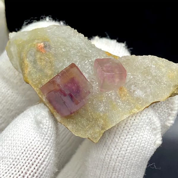 Two magenta fluorite cubes on pale quartz plate from Anhui, China, view 6 of 9