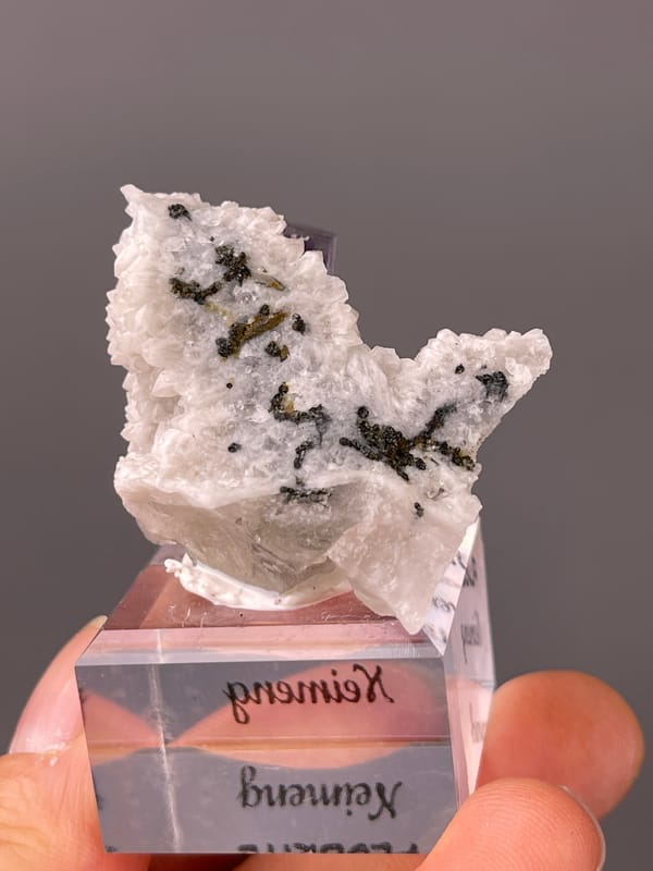 Purple phantom fluorite specimen from Inner Mongolia, China displaying purple zoned cube on white matrix